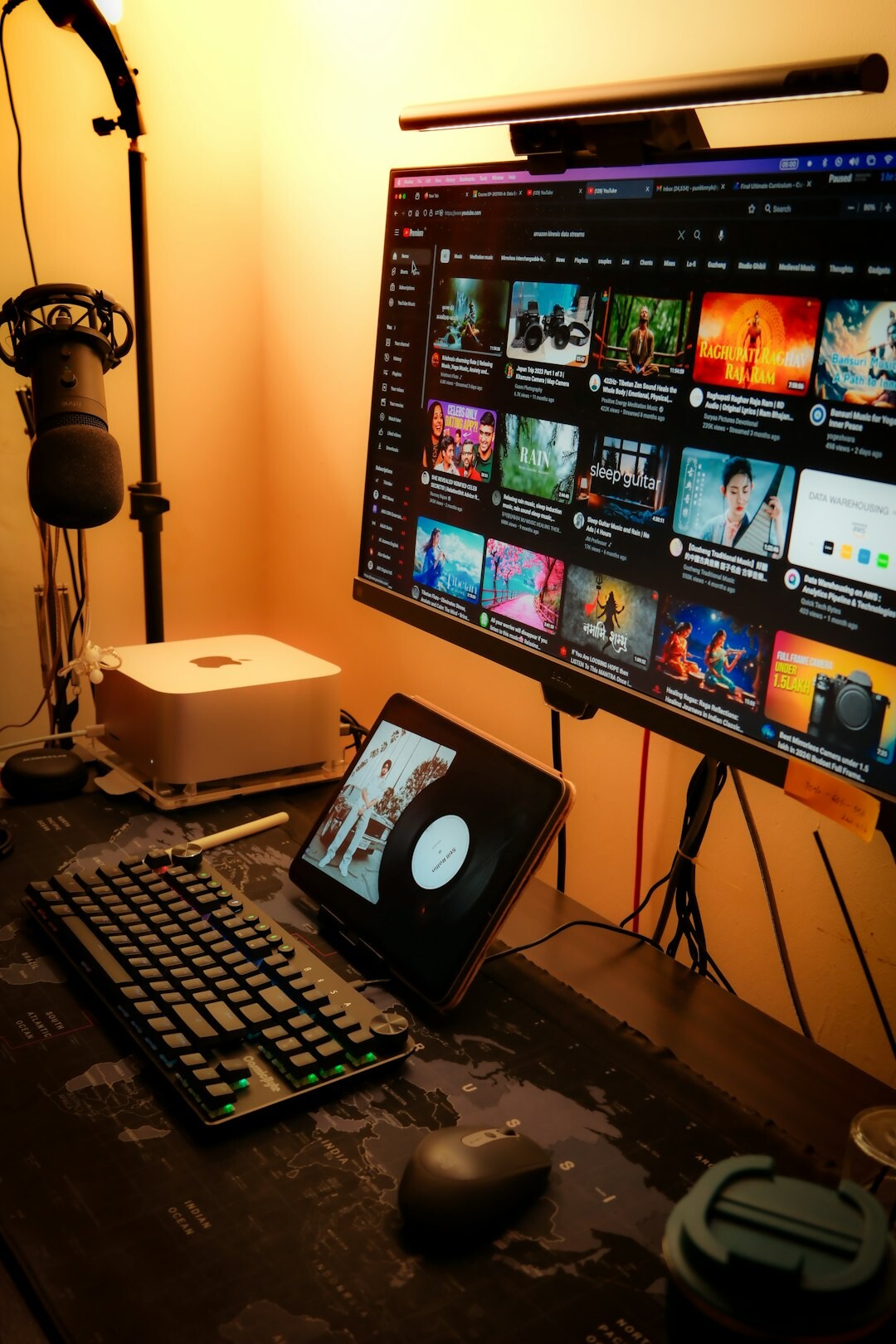 Streaming setup with monitors showing live video output