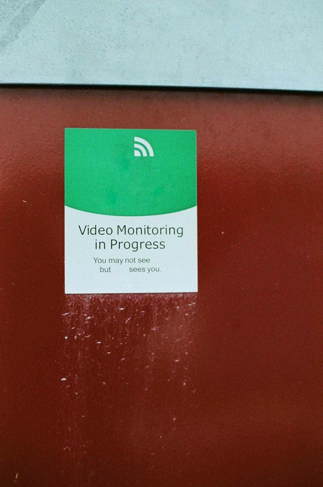 Video operator monitoring live camera feeds on multiple screens